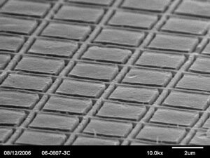 An array of loop nanoantennas imprinted on plastic and imaged with a scanning electron microscope